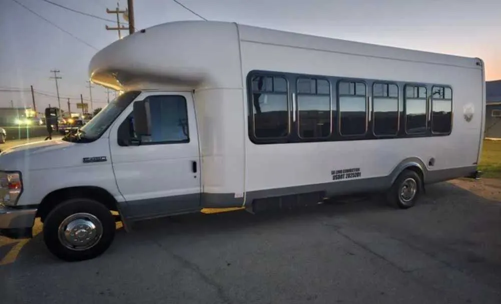 D-Town Bus (white) for party bus rental: full view D-Town Bus (white) for party bus rental: full view